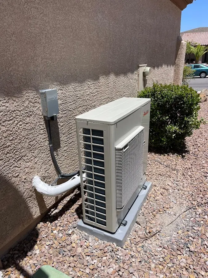 Residential air conditioning condenser unit in Hubbard